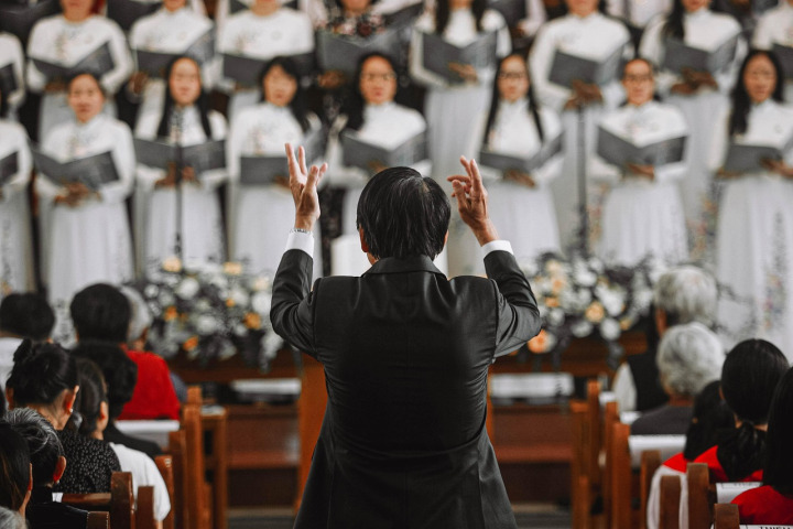 youth orchestra conductor rehearsal